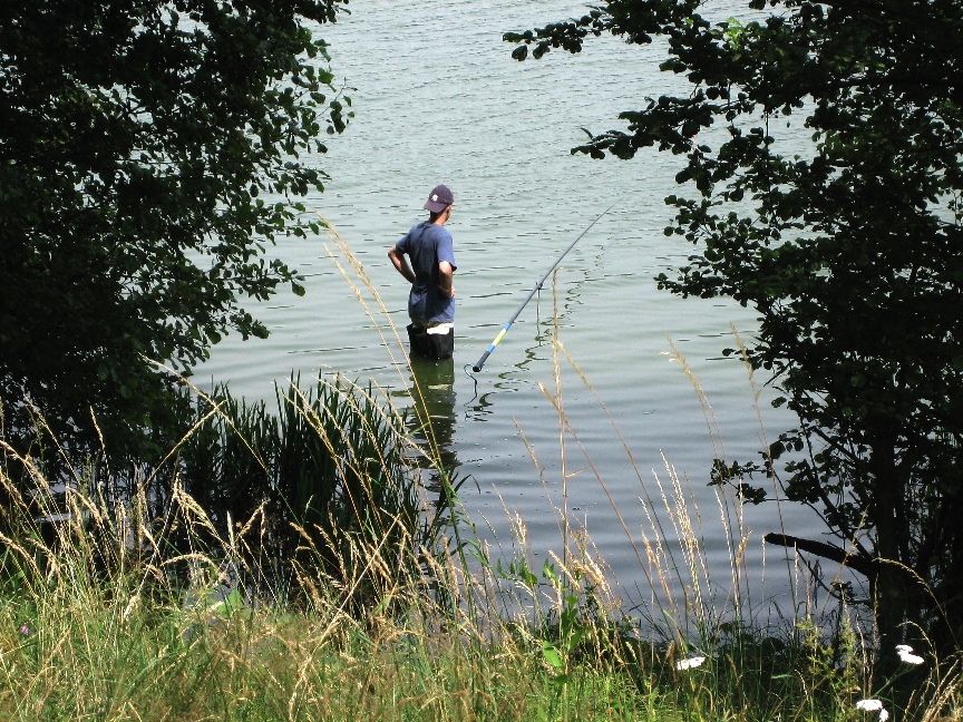 Fishing near the Inter Hotel \n (Click for next picture)